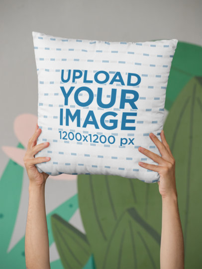 Mockup of Hands Holding a Square Pillow