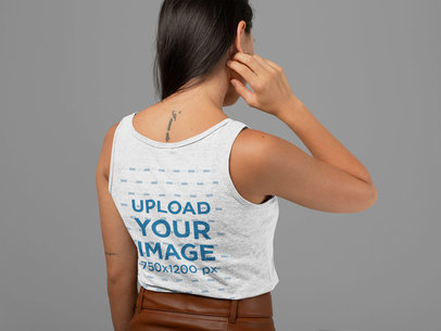 Heathered Tank Top Mockup of a Woman Facing the Wall at a Studio 
