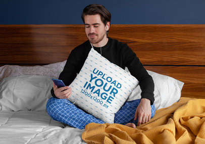 Squared Pillow Mockup Featuring a Man Sitting over a Bed