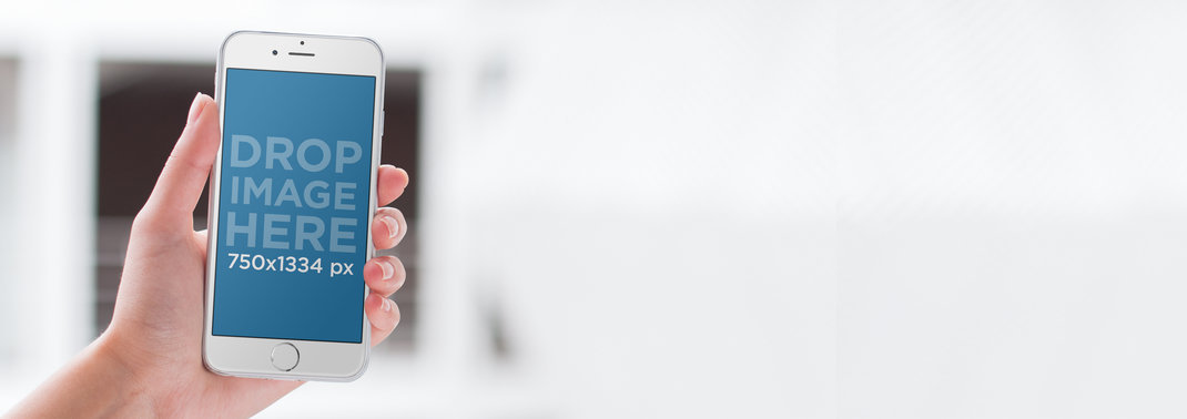 Mockup Template of a Woman Outside an Office Using an iPhone