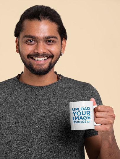 Mockup Featuring a Smiling Man Holding an 11oz Coffee Mug 29091