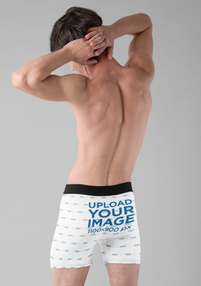 Underwear Mockup of a Man Wearing Boxers and Stretching at a Studio 29203