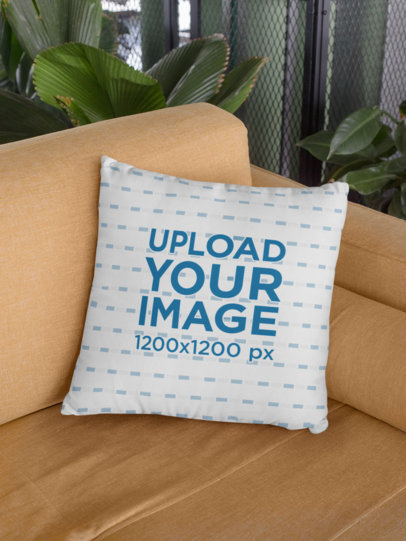 Square Pillow Mockup Placed over a Sofa