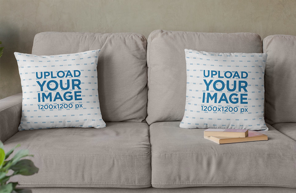 Mockup of Two Squared Pillows Placed over a Couch