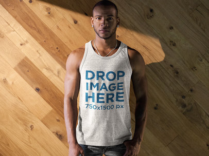 Tank Top Mockup of a Man Standing in Front of a Wooden Wall