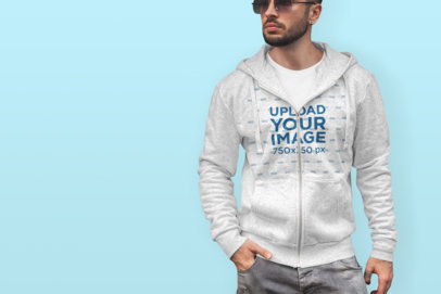 Mockup of a Trendy Man Wearing a Heathered Hoodie in a Colored Background