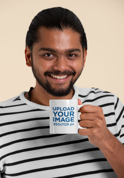 11 oz Coffee Mug Mockup Featuring a Smiling Man with a Beard at a Studio