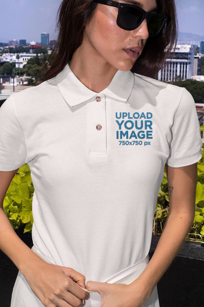 Polo Shirt Mockup of a Stylish Woman Posing Outside 