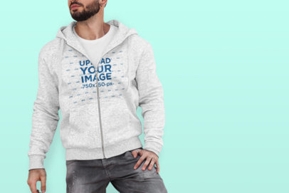 Full-Zip Hoodie Mockup of a Trendy Man Posing at a Studio