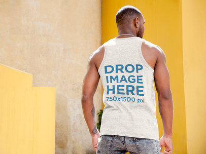 Dude Wearing a Tank Top Mockup Standing Outdoors