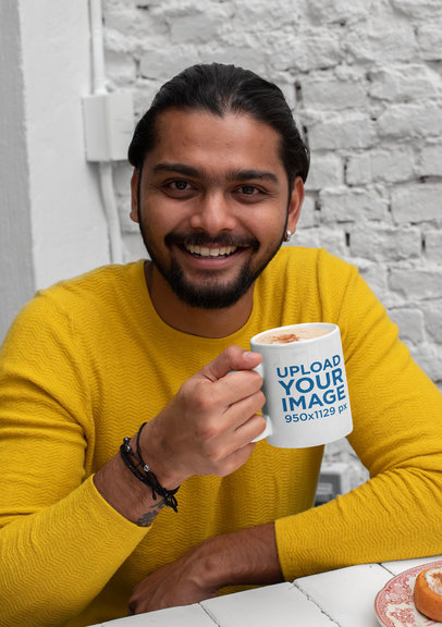 11 oz Coffee Mug Mockup Featuring a Man in a Kitchen 