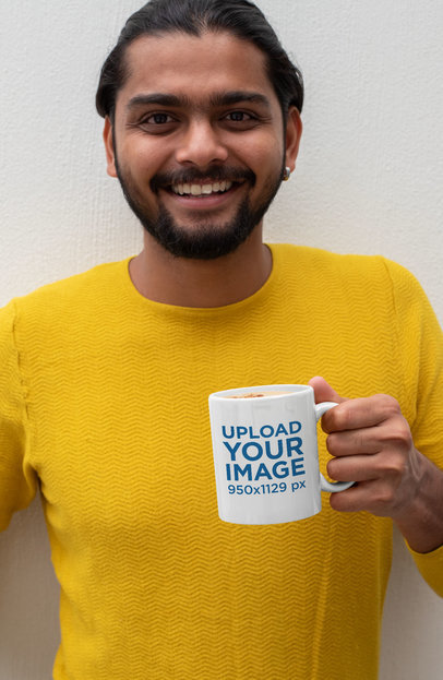 Mockup of a Bearded Man Smiling While Holding an 11 oz Coffee Mug