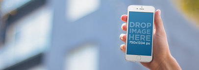 Mockup Template of a Guy in the Street Using an iPhone