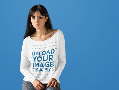 Loose Tee Mockup of a Female Model at a Studio with a Long Sleeve T-Shirt