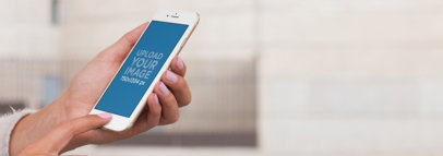 iPhone Mockup of a Girl on the Street Checking a Map on her Phone a9382