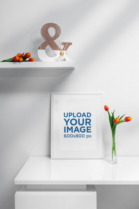 Poster Frame Mockup Featuring a Flower Vase with Tulips 