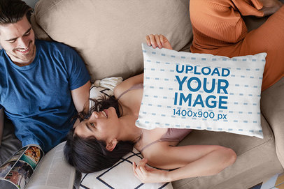 Pillow Mockup Featuring a Couple Chatting on the Couch 