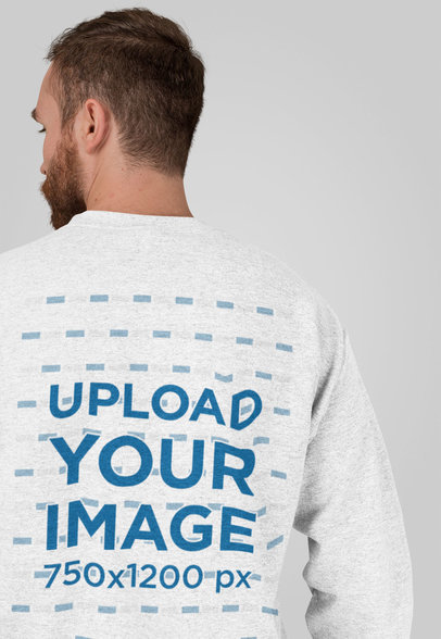 Back View Heathered Sweatshirt Mockup Featuring a Bearded Man at a Studio