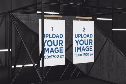 Mockup Featuring Two Posters Hanging from a Black Metal Structure 