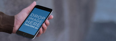 iPhone Mockup Featuring a Man Waiting for a Cab a10041