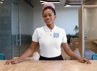 Embroidered Polo Shirt Mockup Featuring a Woman with a Pink Hair Bun 