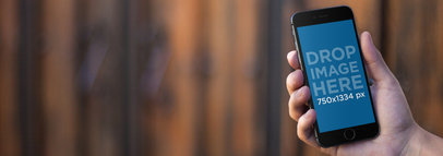 iPhone Mockup Featuring a Guy Waiting at a Front Door a9574