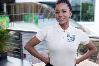 Mockup of a Woman Wearing a Polo Shirt with her Hands on Her Waist