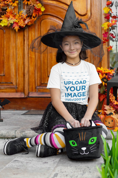 T-Shirt Mockup of a Girl Wearing a Witch Costume