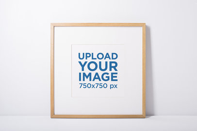 Minimal Mockup Featuring a Photo Frame Against a White Wall 592-el
