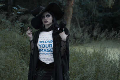 T-Shirt Mockup of a Woman Wearing a Witch Outfit in the Woods 