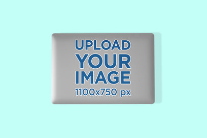 Sticker Mockup Featuring a Macbook Pro on a Color-Custom Surface 673-el
