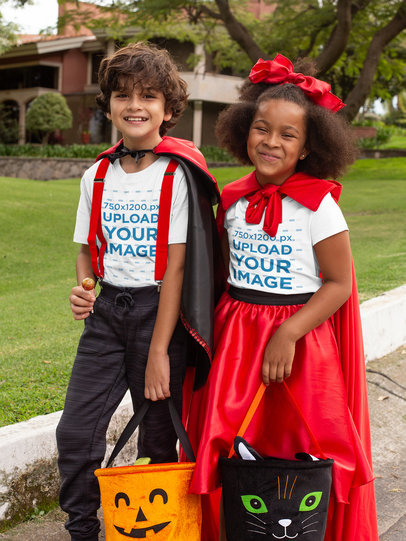 T-Shirt Mockup of a Two Kids Dressed in Halloween Costumes 