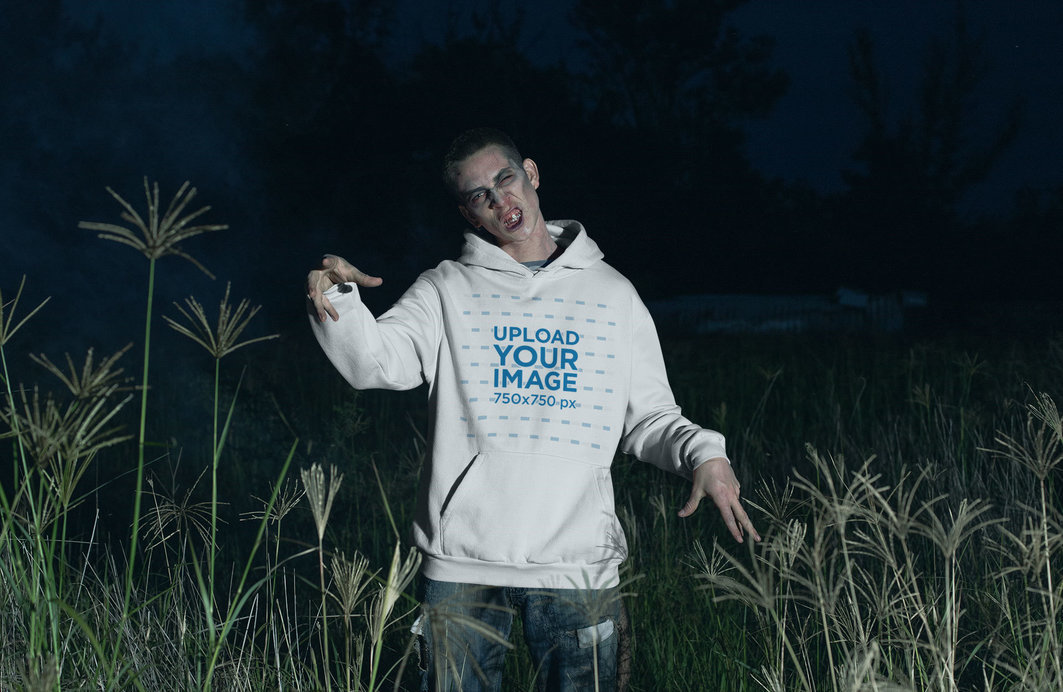 Pullover Hoodie Mockup of a Zombie Man in the Dark