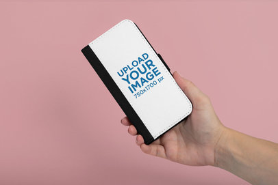 Mockup of a Hand Holding an iPhone 7 Plus Wallet Case 29246