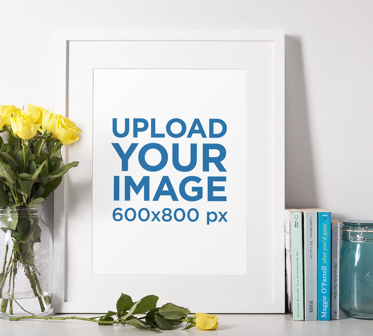 Picture Frame Mockup Featuring a Flower Vase with Yellow Roses
