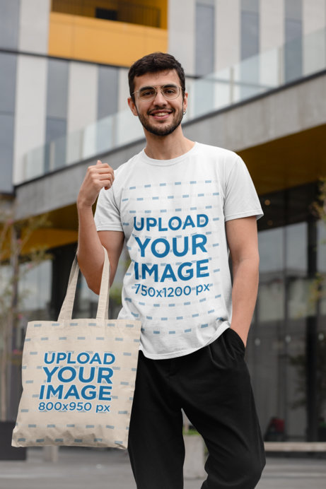Mockup of a Trendy Man Wearing a T-Shirt and Carrying a Tote Bag 