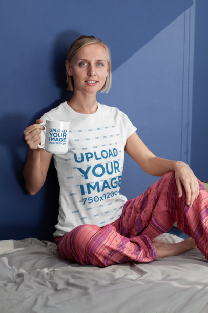 T-Shirt Mockup of a Woman Holding a 15 oz Coffee Mug