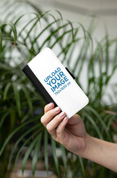 iPhone 8 Wallet Case Mockup Featuring Some Plants in the Background 29237