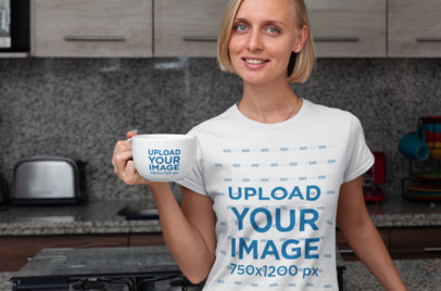 Mockup of a Woman with a T-Shirt and a 24 oz Mug Posing in the Kitchen 29277