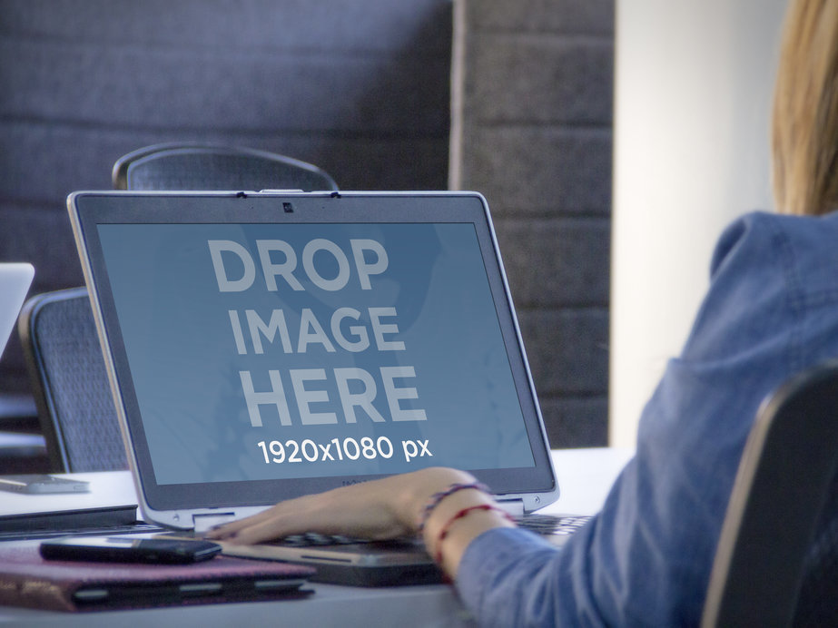 Placeit - Laptop Mockup of a Woman at Her Desk