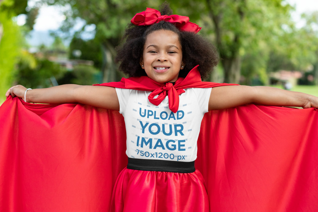 T-Shirt Mockup Featuring a Girl with a Red Cape for Halloween 