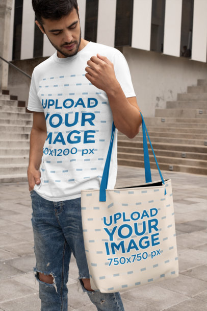 Mockup of a Man with a Crewneck T-Shirt Carrying a Sublimated Tote Bag with Customizable Strap