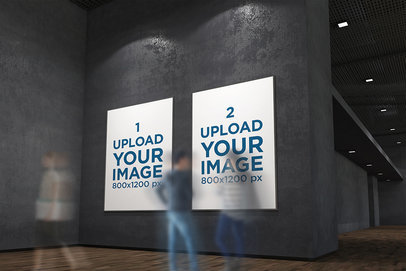 Mockup Featuring Two Exhibition Posters Hanging on a Dark Wall