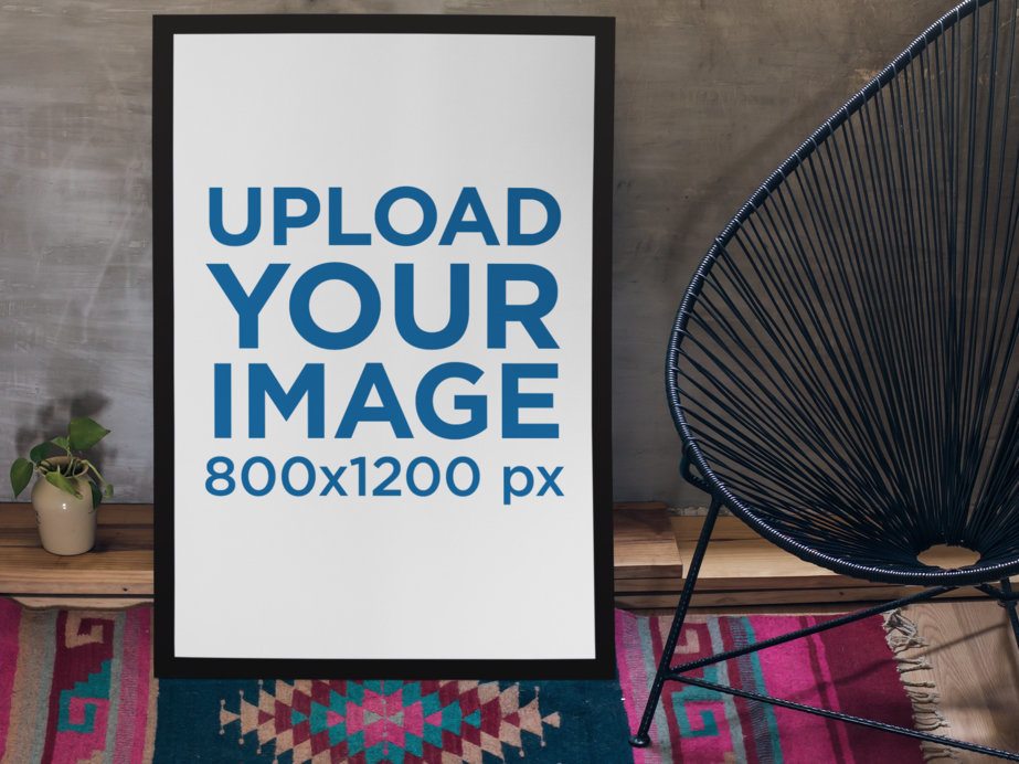 Poster Mockup Leaning Against a Wall in a Stylish Living Room