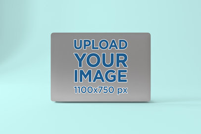 Sticker Mockup Featuring an Open Macbook Pro