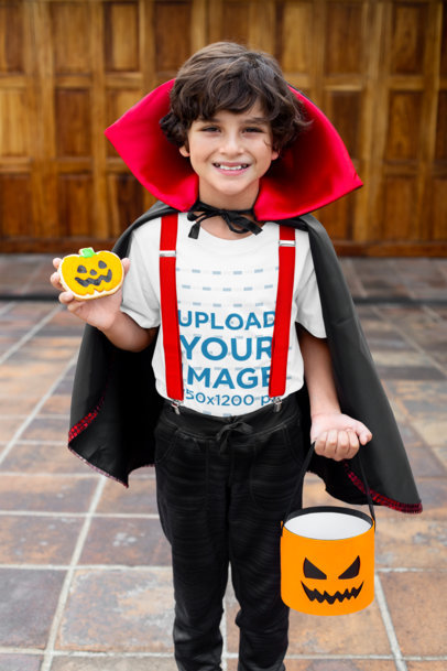 T-Shirt Mockup Featuring a Happy Kid in a Halloween Costume