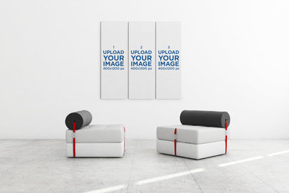 Minimal Mockup Featuring Three Art Prints Hanging Behind Two Modern Couches 
