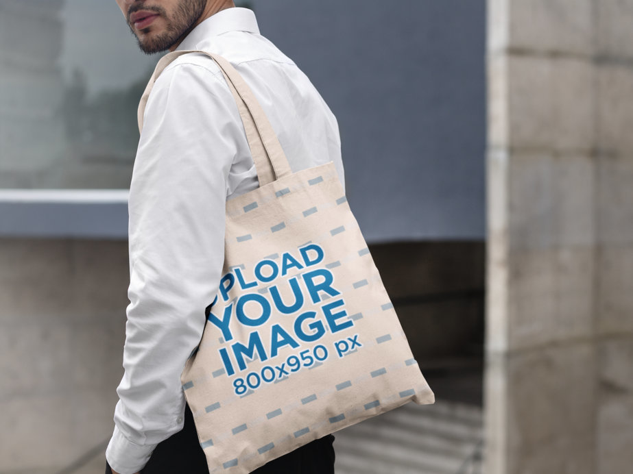 Tote Bag Mockup Featuring a Bearded Man in an Urban Scenario