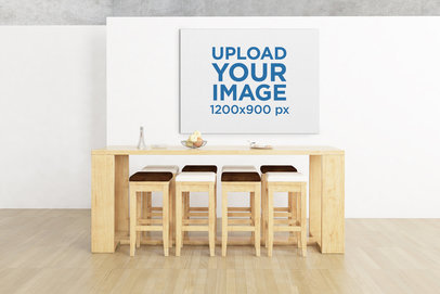 Mockup Featuring an Art Print Hanging Behind a Minimalist Table