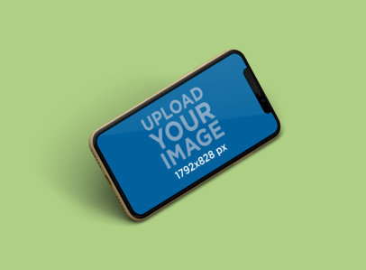 Mockup of an iPhone 11 Placed Against a Plain Backdrop  